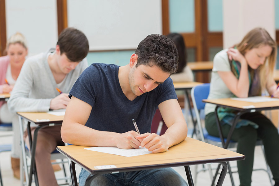 Students taking a test in a classroom in Austin